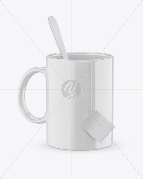 Glossy Mug With Tea Bag &amp; Spoon Mockup (High-Angle Shot)