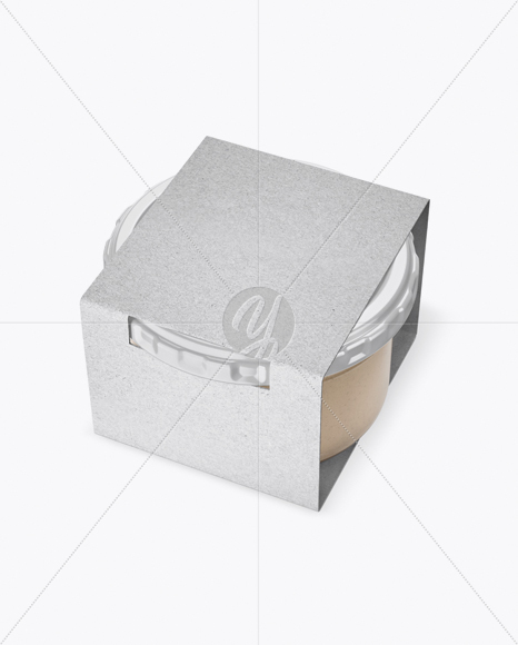 Clear Glass Cesar Sauce Jar in Kraft Paperboard Sleeve Mockup - Half Side View Clear Glass Cesar Sauce Jar in Kraft Paperboard Sleeve Mockup - Half Side View