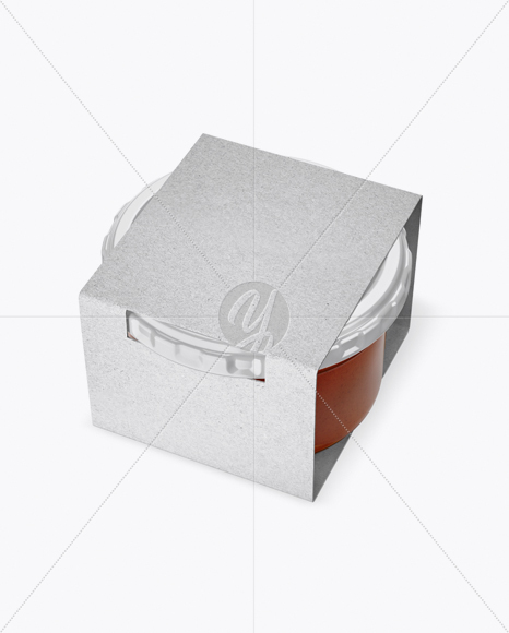 Clear Glass Sauce Jar in Kraft Paperboard Sleeve Mockup - Half Side View Clear Glass Sauce Jar in Kraft Paperboard Sleeve Mockup - Half Side View