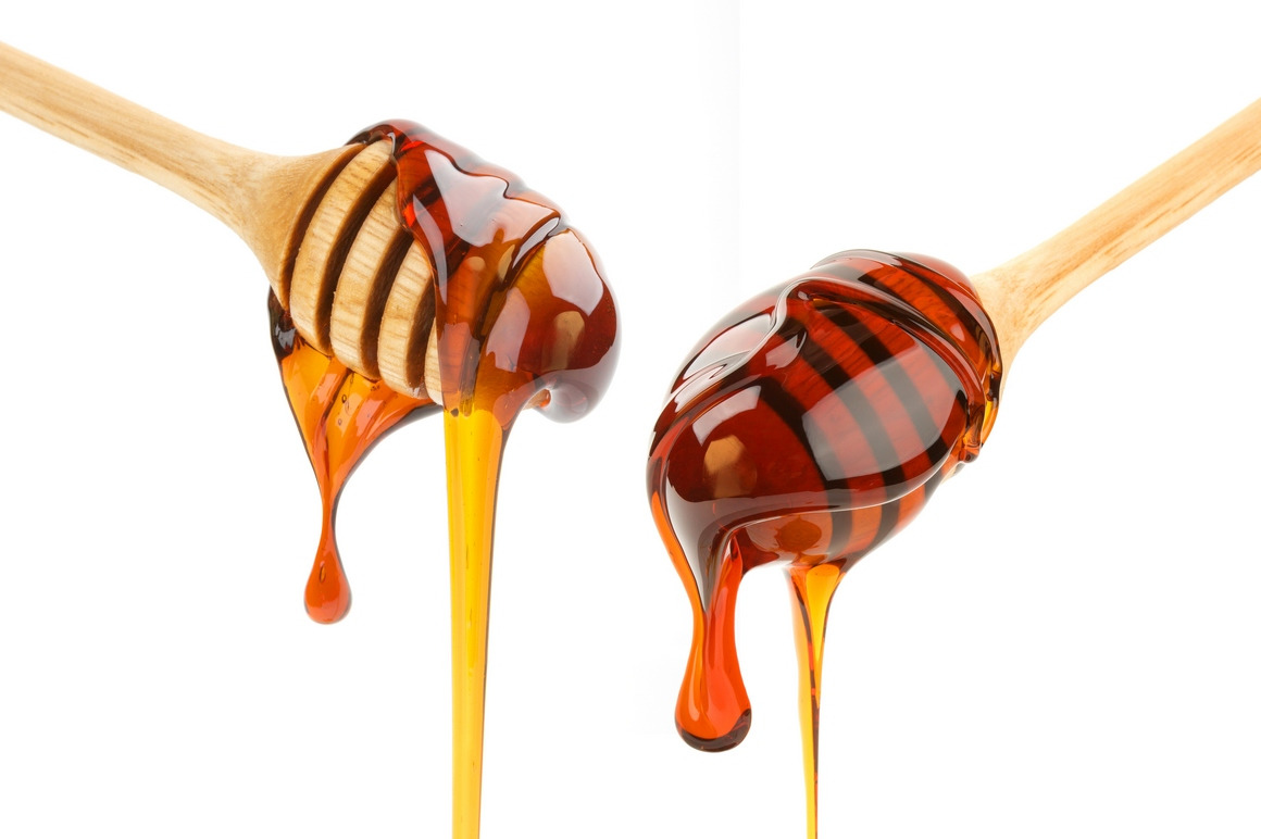 Honey isolated on white background Honey isolated on white background
