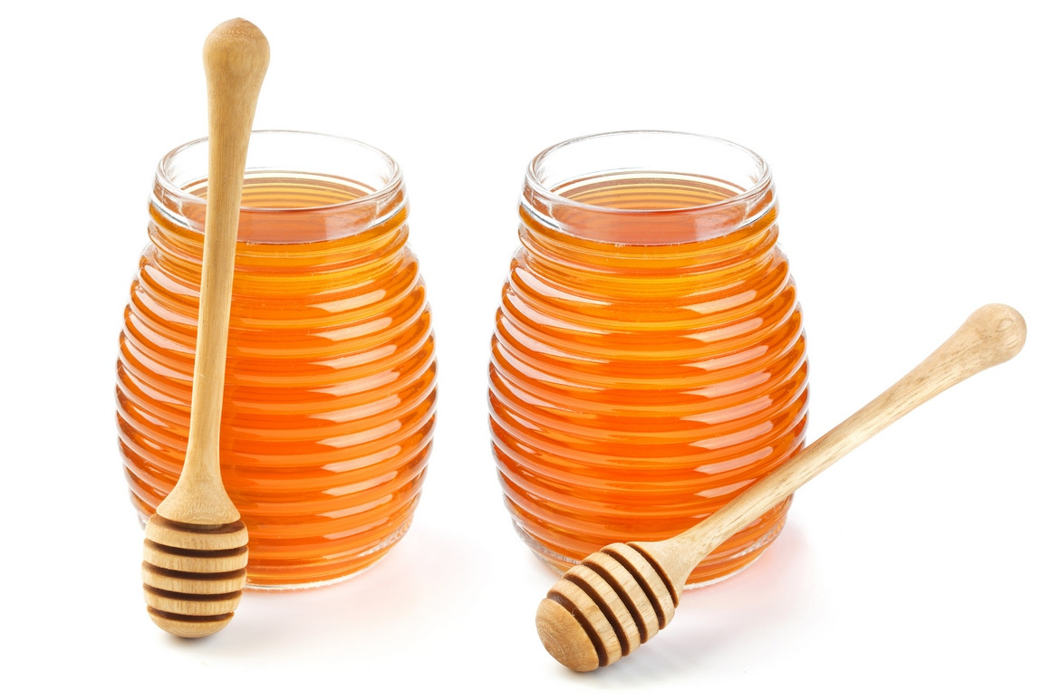 Honey isolated on white background Honey isolated on white background