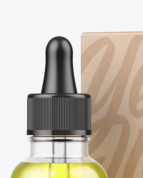 Clear Glass Dropper Oil Bottle w/ Kraft Box Mockup Clear Glass Dropper Oil Bottle w/ Kraft Box Mockup