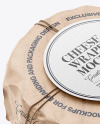 Cheese Wheel Wrapped In Kraft Paper Mockup