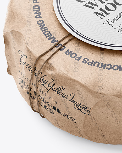 Cheese Wheel Wrapped In Kraft Paper Mockup