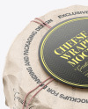 Cheese Wheel Wrapped In Kraft Paper Mockup