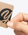 Kraft Business Card in a Hand Mockup