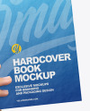 Hardcover Book in a Hand Mockup