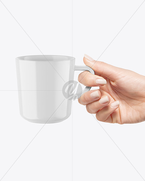 Glossy Mug in a Hand Mockup