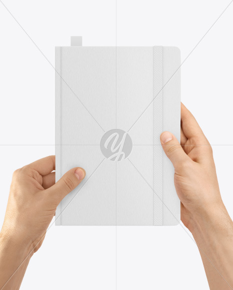 Notebook in a Hand Mockup