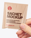 Kraft Sachet in a Hand Mockup