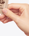 Kraft Sachet in a Hand Mockup