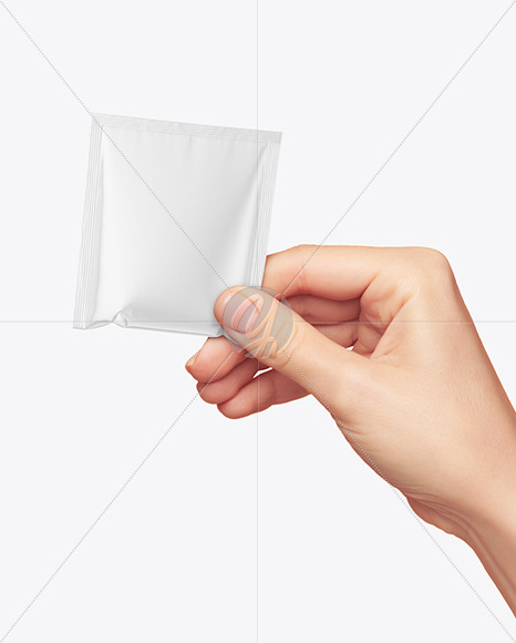 Glossy Sachet in a Hand Mockup