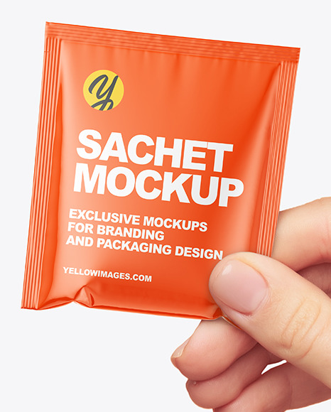 Glossy Sachet in a Hand Mockup