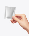 Metallic Sachet in a Hand Mockup