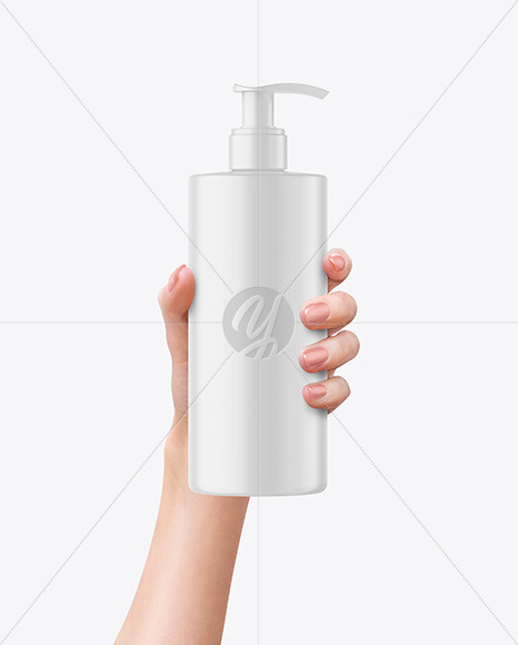 Matte Cosmetic Bottle with Pump in a Hand Mockup