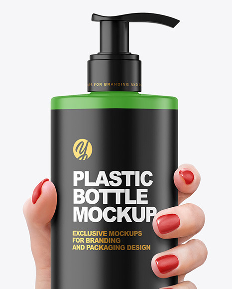 Matte Cosmetic Bottle with Pump in a Hand Mockup