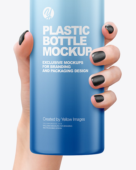 Matte Cosmetic Bottle with Pump in a Hand Mockup