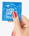 Glossy Square Condom Packaging in a Hand Mockup