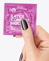 Glossy Square Condom Packaging in a Hand Mockup