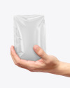 Glossy Food Bag in a Hand Mockup