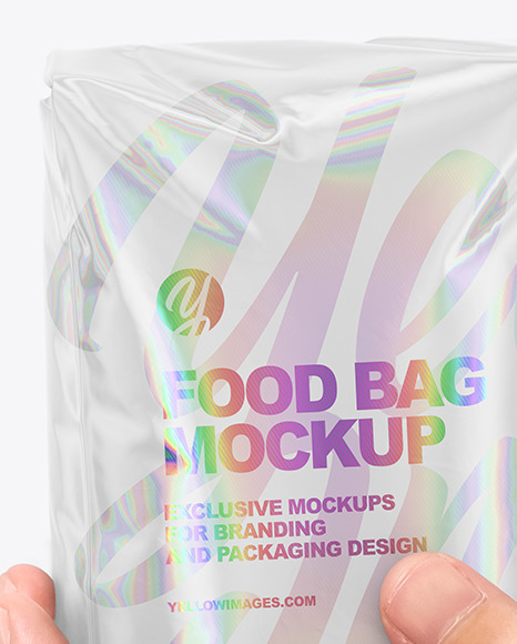 Glossy Food Bag in a Hand Mockup