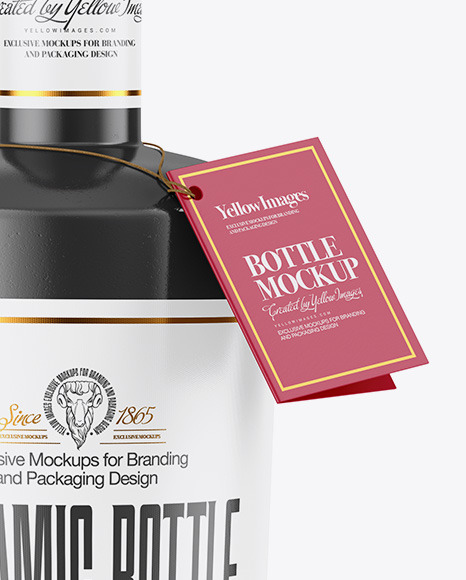 Glossy Ceramic Bottle with Paper Book Mockup