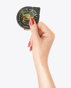 Glossy Condom Packaging in a Hand Mockup