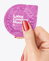 Matte Condom Packaging in a Hand Mockup