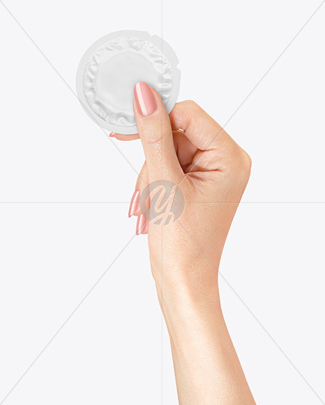 Matte Condom Packaging in a Hand Mockup