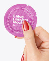 Matte Condom Packaging in a Hand Mockup