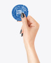 Glossy Condom Packaging in a Hand Mockup