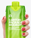 500ml Glossy Carton Pack in a Hand Mockup