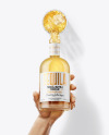 Tequila Bottle in the Hand Mockup