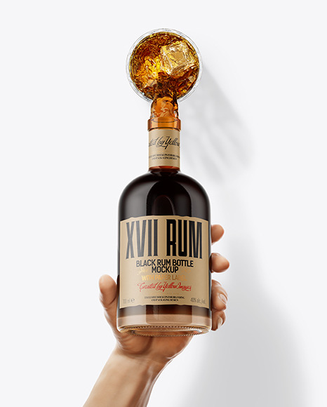 Black Rum Bottle in the Hand Mockup