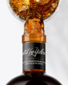 Black Rum Bottle in the Hand Mockup