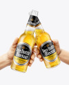 Two Clear Glass Beer Bottles in the Hands Mockup