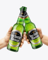 Two Green Glass Beer Bottles in the Hands Mockup