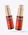 Two Frosted Amber Glass Spray Bottles Mockup