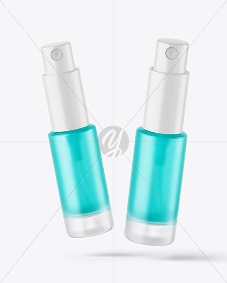 Two Frosted Glass Spray Bottles with Color Liquid Mockup