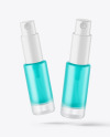 Two Frosted Glass Spray Bottles with Color Liquid Mockup