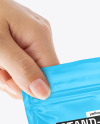 Glossy Stand Up Pouch in a Hand Mockup