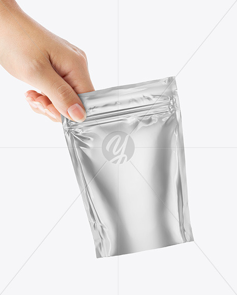 Metallic Stand Up Pouch in a Hand Mockup