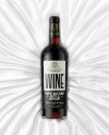 Clear Glass Red Wine Bottle Lying on a Silk Cloth Mockup