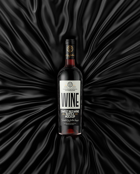 Clear Glass Red Wine Bottle Lying on a Silk Cloth Mockup