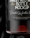 Clear Glass Red Wine Bottle Lying on a Silk Cloth Mockup