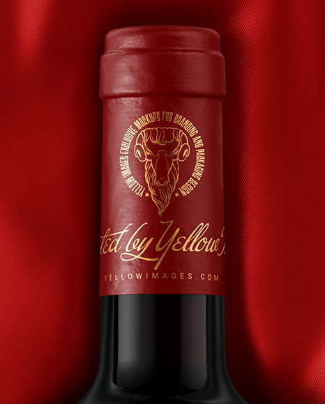 Green Glass Red Wine Bottle Lying on a Silk Cloth Mockup