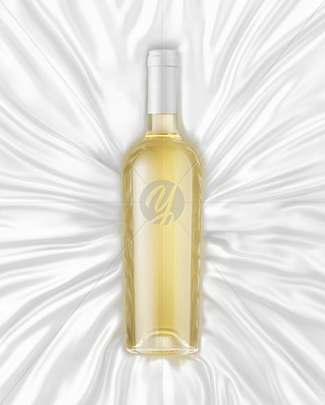 Clear Glass White Wine Bottle Lying on a Silk Cloth Mockup
