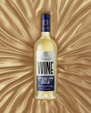 Clear Glass White Wine Bottle Lying on a Silk Cloth Mockup