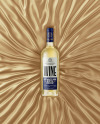 Clear Glass White Wine Bottle Lying on a Silk Cloth Mockup