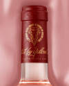 Clear Glass Pink Wine Bottle Lying on a Silk Cloth Mockup